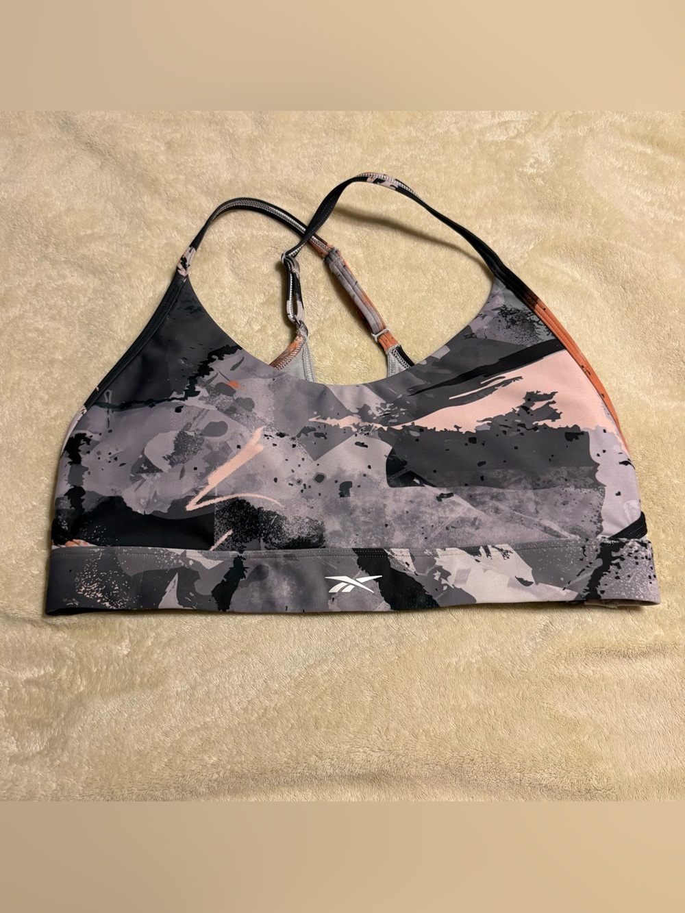 Reebok Abstract Print Sports Bra in Pink, Gray & Black